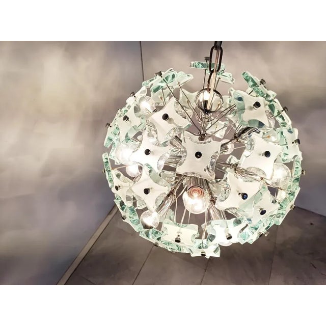 Mid-Century Sputnik Chandelier in Glass, 1970s, in Good conditions. Designed 1970 to 1979 Up to 250V (Europe/UK...