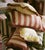 Our 100% yarn dyed Indian Cotton oblong Sonia cushion has a complementary colored ruche trim detail and duck feather...