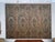 This is a wonderful four-panel folding screen covered in embossed and polychrome leather, the surface worked in a rich...