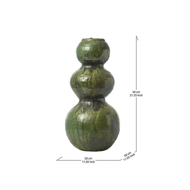 Three curves, one continuous gesture. This vase rises in a graceful triple-gourd silhouette, each rounded form stacked and...