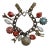 Vintage Travel Charm Bracelet in Goldtone With Lucite and Faux Coral Charms For Sale