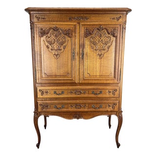 Vintage French Louis XVI Style Oak Cabinet with Carved Panels For Sale
