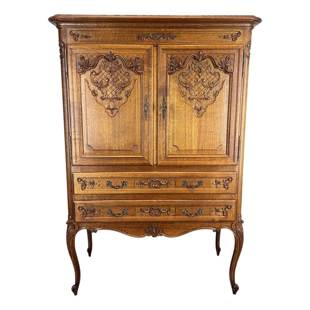 Vintage French Louis XVI Style Oak Cabinet with Carved Panels For Sale