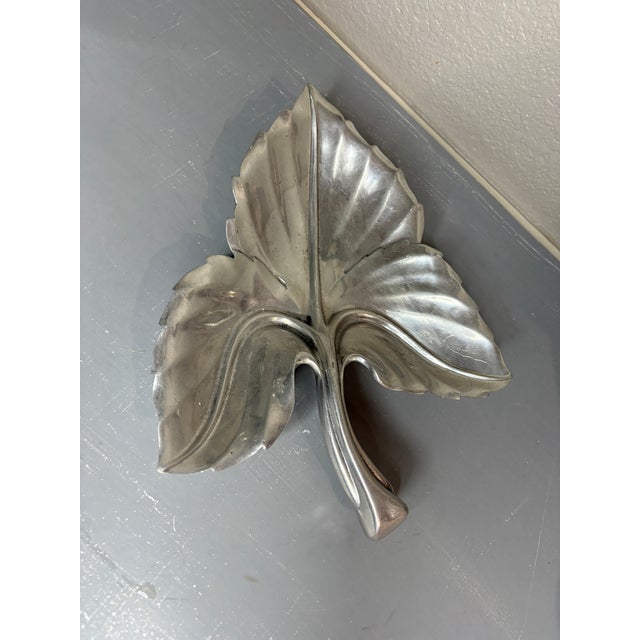 Sculptural vintage Bruce Fox leaf bowl crafted in heavy cast aluminum. This mid-century piece showcases Fox’s signature...