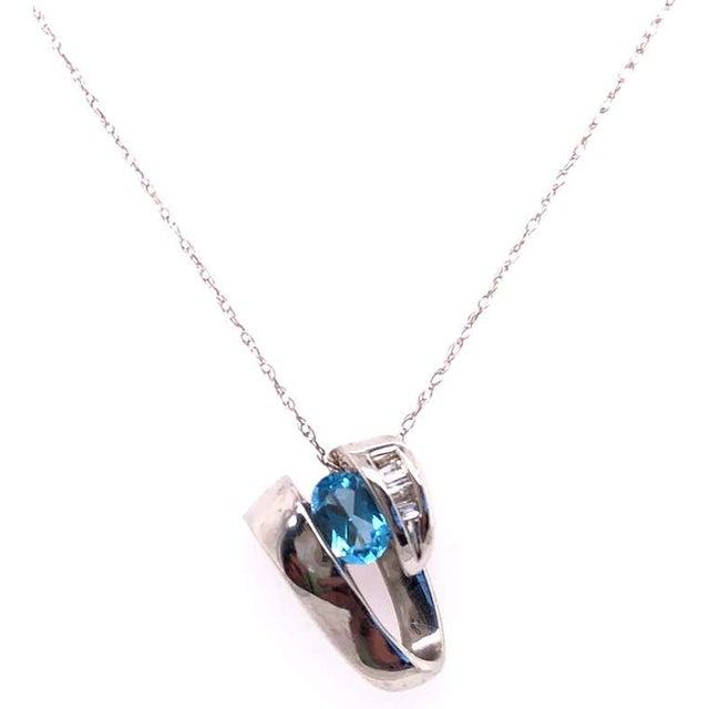 14 Karat White Gold Link With Oval Blue Topaz and Baguette Diamonds For Sale In New York - Image 6 of 9