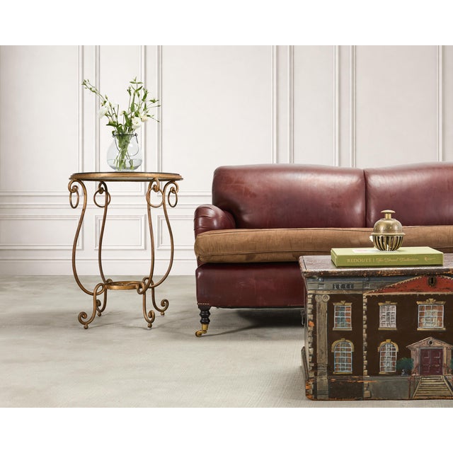 Exquisite iron and black granite centre table or occasional table made in the style and manner of French designer Rene...