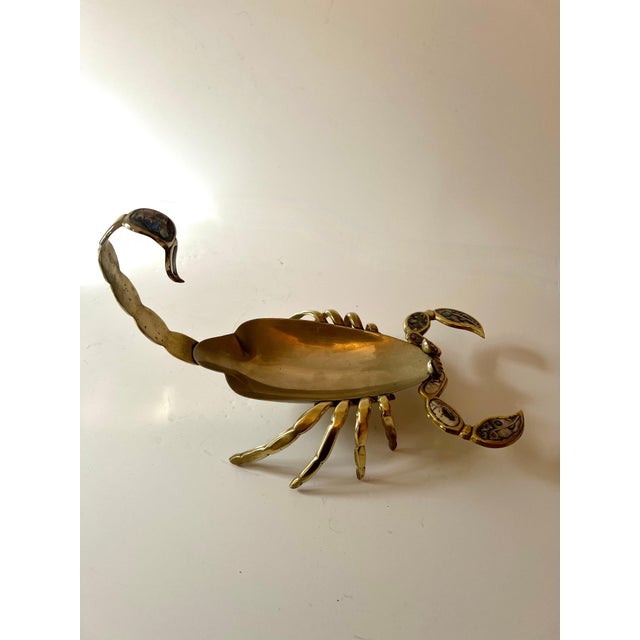 A wonderful Mexican Metalwork in the style of Los Castillo. The shape is that of a Scorpion with Brass legs, tail and...