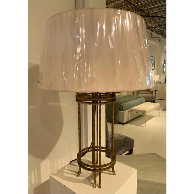 Visual Comfort's Cage Table Lamp in Gilded Iron with a Natural Paper Shade.