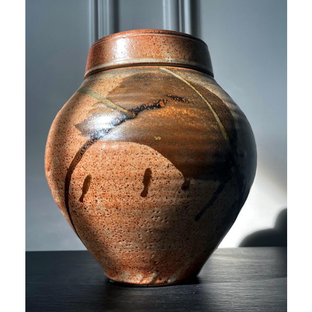 A ceramic (earth ware) lidded jar with glazed surface by American studio potter Karen Karnes (1925-2016). The mark on the...