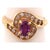 14 Karat Yellow Gold Purple Peridot Ring with Round Diamond Accents 0.14 TDW. Size 7.5 3.48 grams total weight.