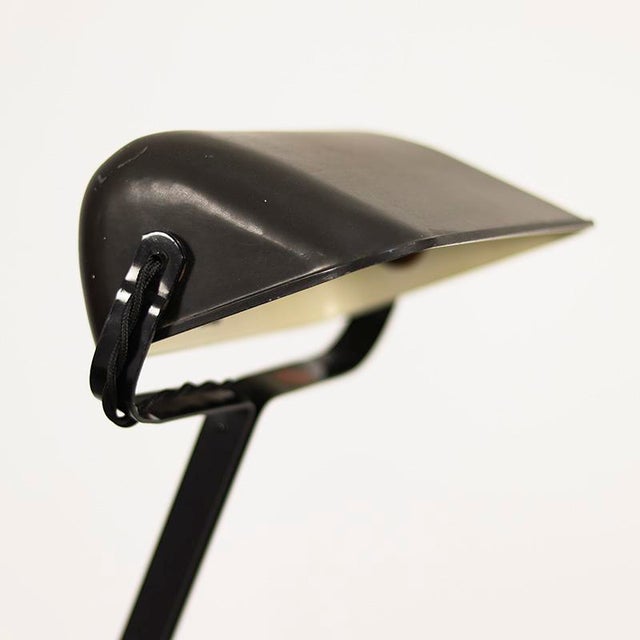 Very decorative Art-Deco desk lamp by Erpe from the 1920s. The lamp has a Bakelite shade and can be adjusted to various...