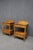 Pair of Hitchcock maple nightstands with two drawers, lower shelf, turned legs, and decorated backsplashes. Each table...