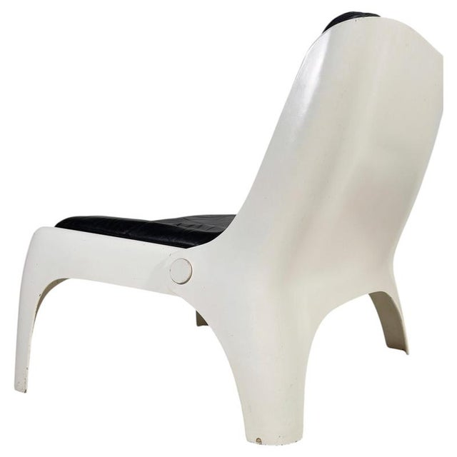Make a bold statement with this exceptionally rare pair of lounge chairs, designed and produced by Carl Straub GmbH in...