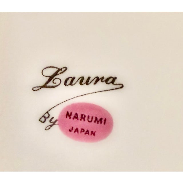 “Laura” by Narumi Japan fine China service for twelve consisting of 84 pieces including serving pieces. It was produced...