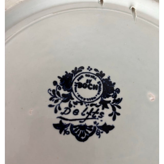 Lovely delft Charger is classic blue and white with a countryside homestead scene. Excellent quality and condition with...