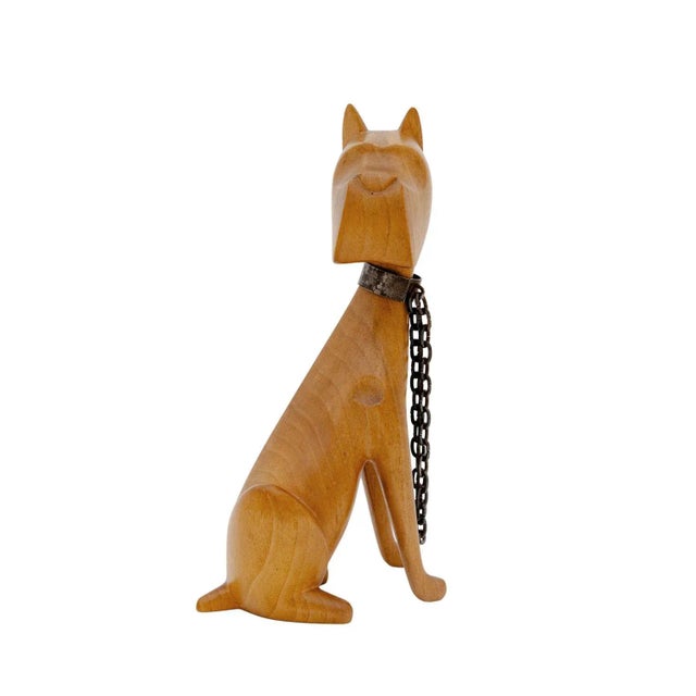 Sitting Dog, Werkstatte Hagenauer Vienna, ca. 1950, carved wood, brass patinated, marked Depictions of animals were a...