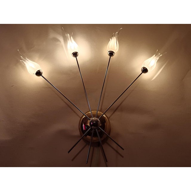 A most sensational and extremely rare pair of sconces, by legendary Muranese Glass Master and designer Aureliano Toso,...