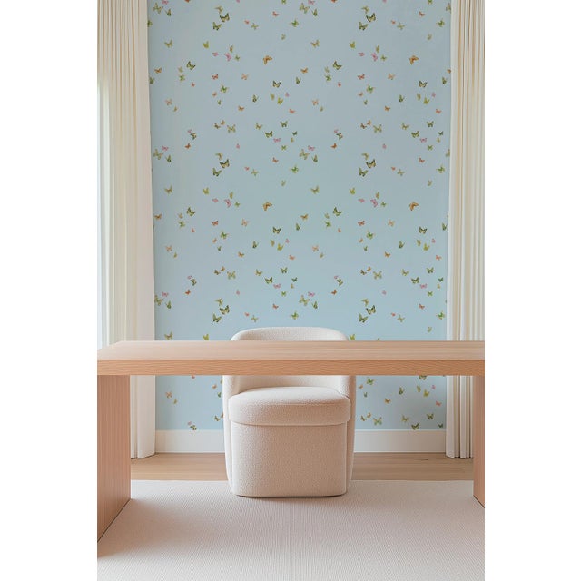 Our Butterfly Grove wallpaper design was inspired by a freshly bloomed English Garden with butterflies fluttering in the...
