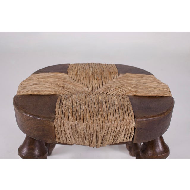 Set of three wood-carved and straw fireplace stools, 1960s. H 35 cm x w 35 cm x d 35 cm. Price for the set of three...