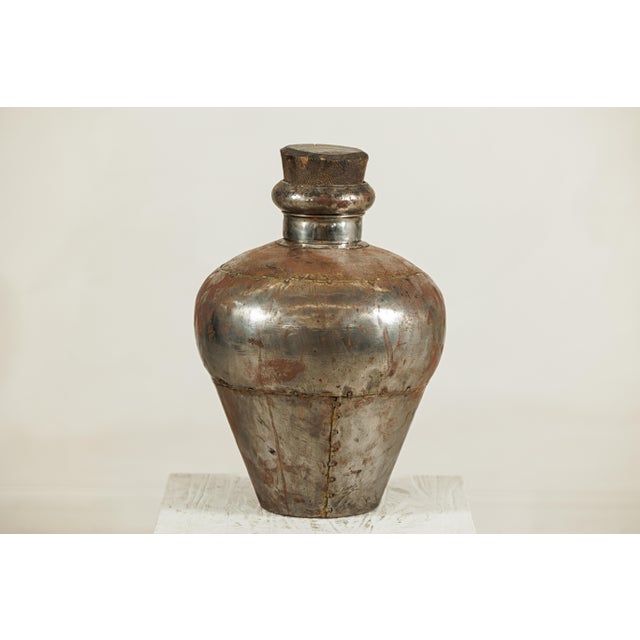 "About the Item This vintage Indian metal water vessel is a striking example of utilitarian craftsmanship elevated by time...