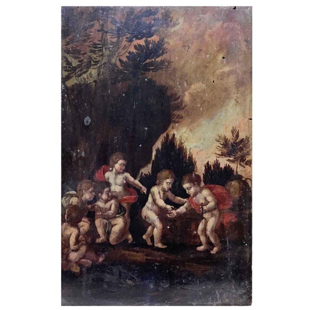 Pair of Landscapes with Putti, oil paintings on walnut panels. In the first painting, five putti are depicted in the...
