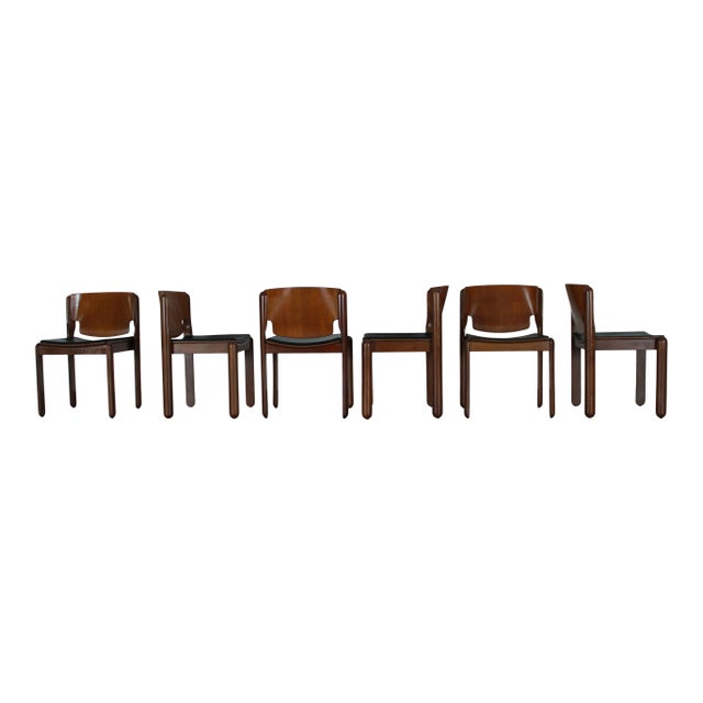 A refined set of six Model 122 dining chairs, designed by Vico Magistretti for Cassina in 1967. These iconic stackable...