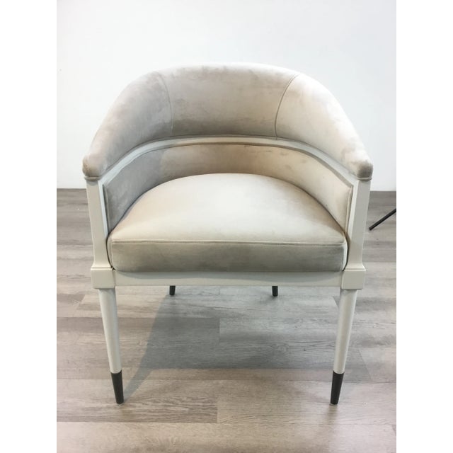 Stylish Caracole Signature Modern Gray Velvet Arm Chair, white wood frame adorning black metal ferrules on a tapered leg,...