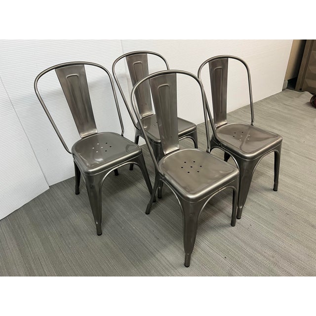 Design Plus Gallery presents a Set of Four Galvanized Steel A-Chairs by Xavier Pauchard for Tolix. These chairs are heavy-...