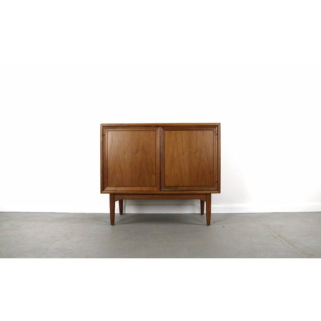 This beautiful american black walnut cabinet is designed by Kipp Stewart for Drexel’s Declaration line. Classic, iconic...