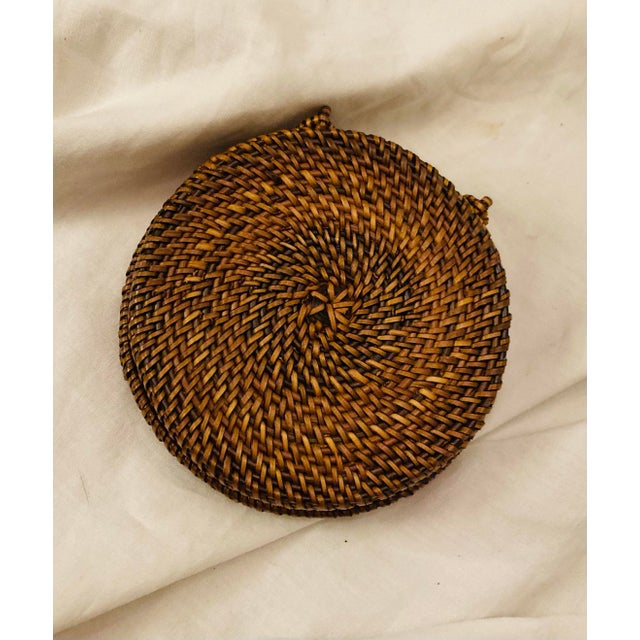 Set of Four Round Coasters Inclosed in Woven Wicker Case For Sale - Image 4 of 5