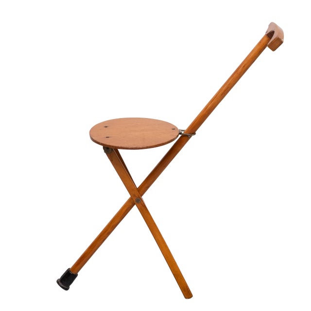 A Finnish folding seat /walking stick designed for the 1952 summer Olympics in Helsinki. Good working condition.