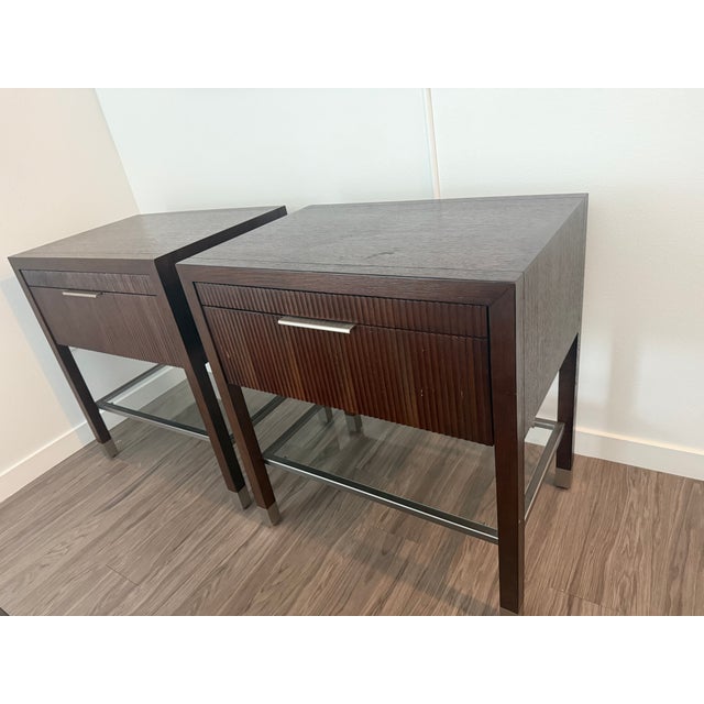 Set of 2 Attributed to Ethan Allen Valermo night tables. Large chestnut finish with tempered glass storage shelf and...