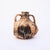 A typical oil barrel from the Saintonge region, made of lightweight terracotta, retaining all the understated charm of...