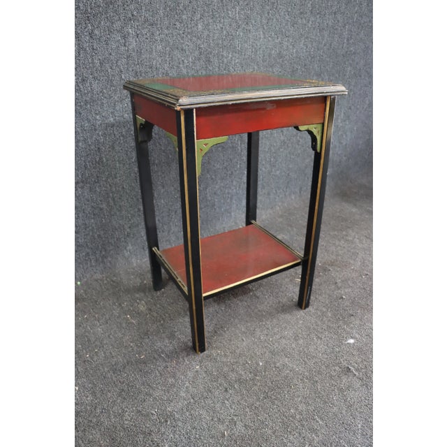 Chinese Chippendale Style Paint Decorated Side Table, banded red painted top, ebonized and gilt painted stretcher base,...