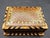 This marvelous vintage 1980s Morocan trinket box is created in gorgeous marquetry wood, inset with mother of pearl. The...