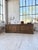 Antique 1950s oak trade or shop counter, measuring 2.5 meters in length. it has a striking appearance with its paneled...