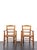 French work in the style of charlotte perriand pair of armchairs france, circa 1960 wood & straw h: 95 cm / w: 55 cm / d:...