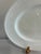 An oval ironstone platter from Wedgwood & Co. Ltd's Hedge Rose pattern, in all-white glaze with a delicately embossed...