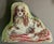 Needlepoint dog pillow of a King Charles Spaniel. Mounted on light green velvet back with self welt trim. Measures 14"...