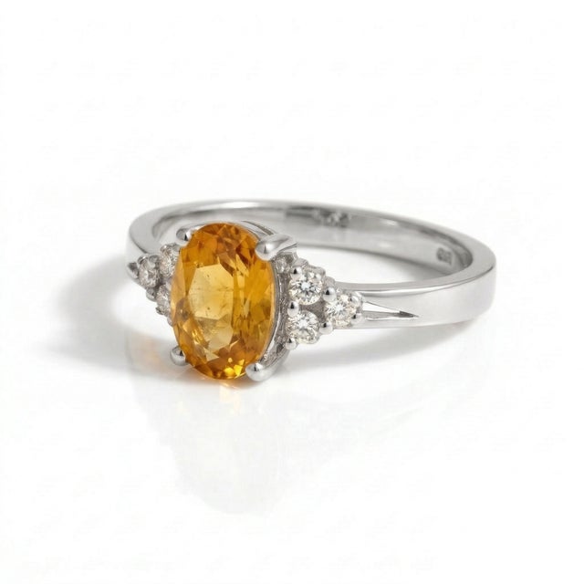 This exquisite ring features a radiant Citrine gemstone set in a warm, luxurious gold band, creating a timeless piece that...