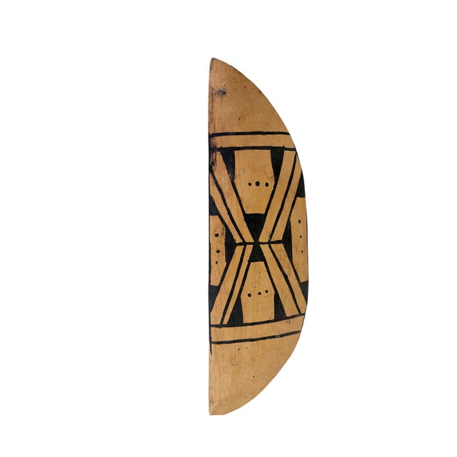 Vintage Mehinaku Tribe spatula for spreading manioc dough, Xingu Brazil. 15" W x 4.75" H x 0.25" D. This semilunar wooden...