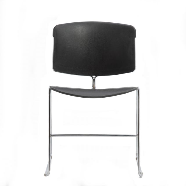 A hard to find set of 25 Steelcase Max Stacker stacking chairs with the original dolly. Black plastic seats and backs and...