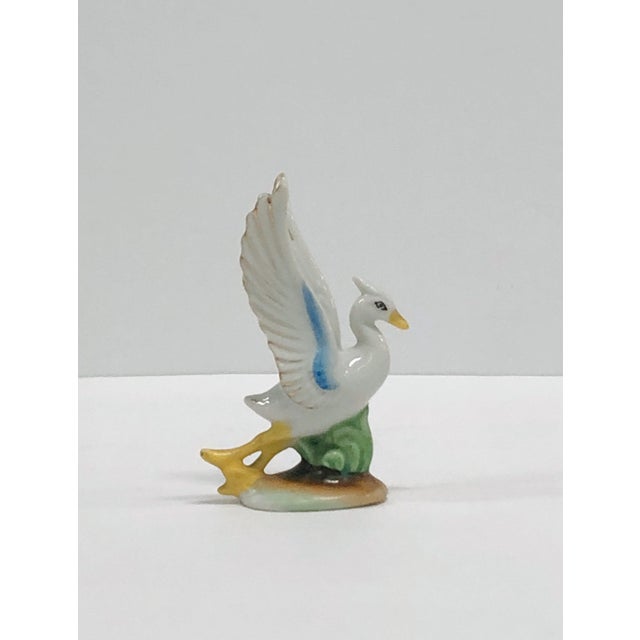 This Rare Vintage 1940s Japanese Porcelain White Heron Figurine is a delightful decoration for collectors or lovers of...