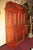 A very fine bookcase with unusual chinoiserie style decoration and code of arm. Applied wrought iron mounts. Stock number: .