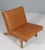 Hans j. Wegner lounge chair with loose cushions new upholstered with vintage tan full grain aniline leather. Frame of...