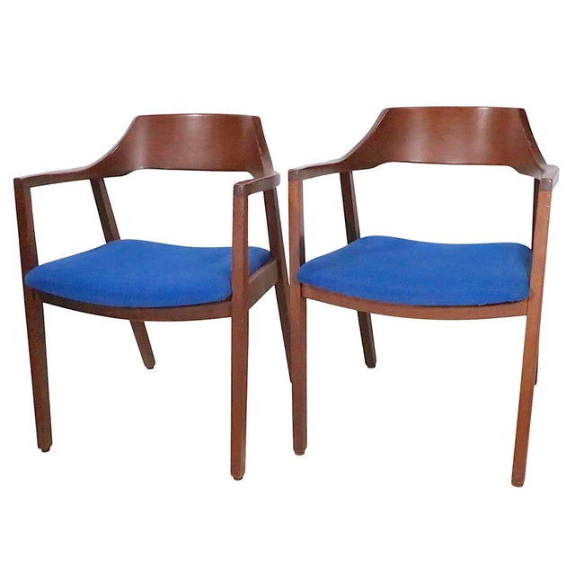 Pair of Mid Century arm chiars by the Jasper Chair Company, circa 1950/60's. The chairs feature architecturally designed...