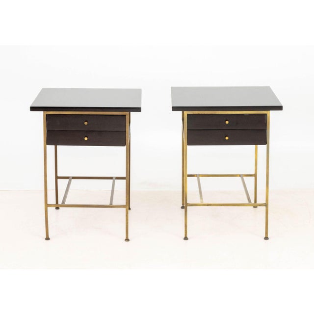 Pair of Paul McCobb for Calvin "Irwin Collection" Nightstands, each with ebonized wood top and two drawers on brass frame,...