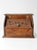 This vintage wood bread box features a hand-carved 'BREAD' inscription and a warm, rustic finish. It's a charming piece...