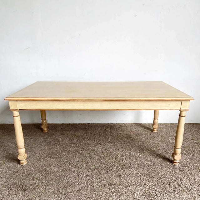 Embrace vintage elegance with our Vintage Regency White Wash Wooden Dining Table. This charming piece features a white-...