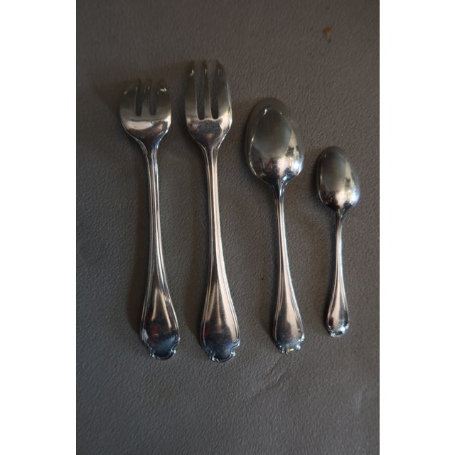 A substantial 127-piece silver-plated flatware set by Christofle: - 12 dinner forks - 12 dinner spoons - 12 dinner knives...